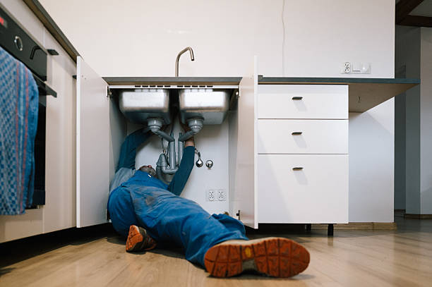 Professional Drain Cleaning technician working in Zellwood, FL